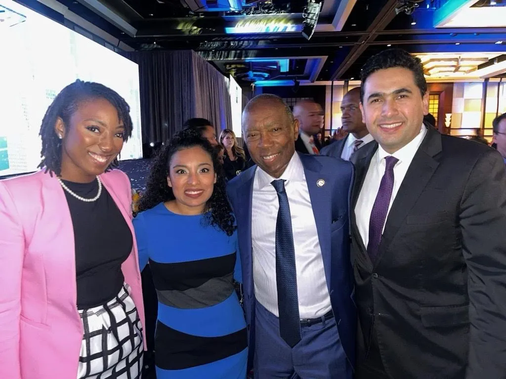 Nicole King with fellow leaders at a civic event.