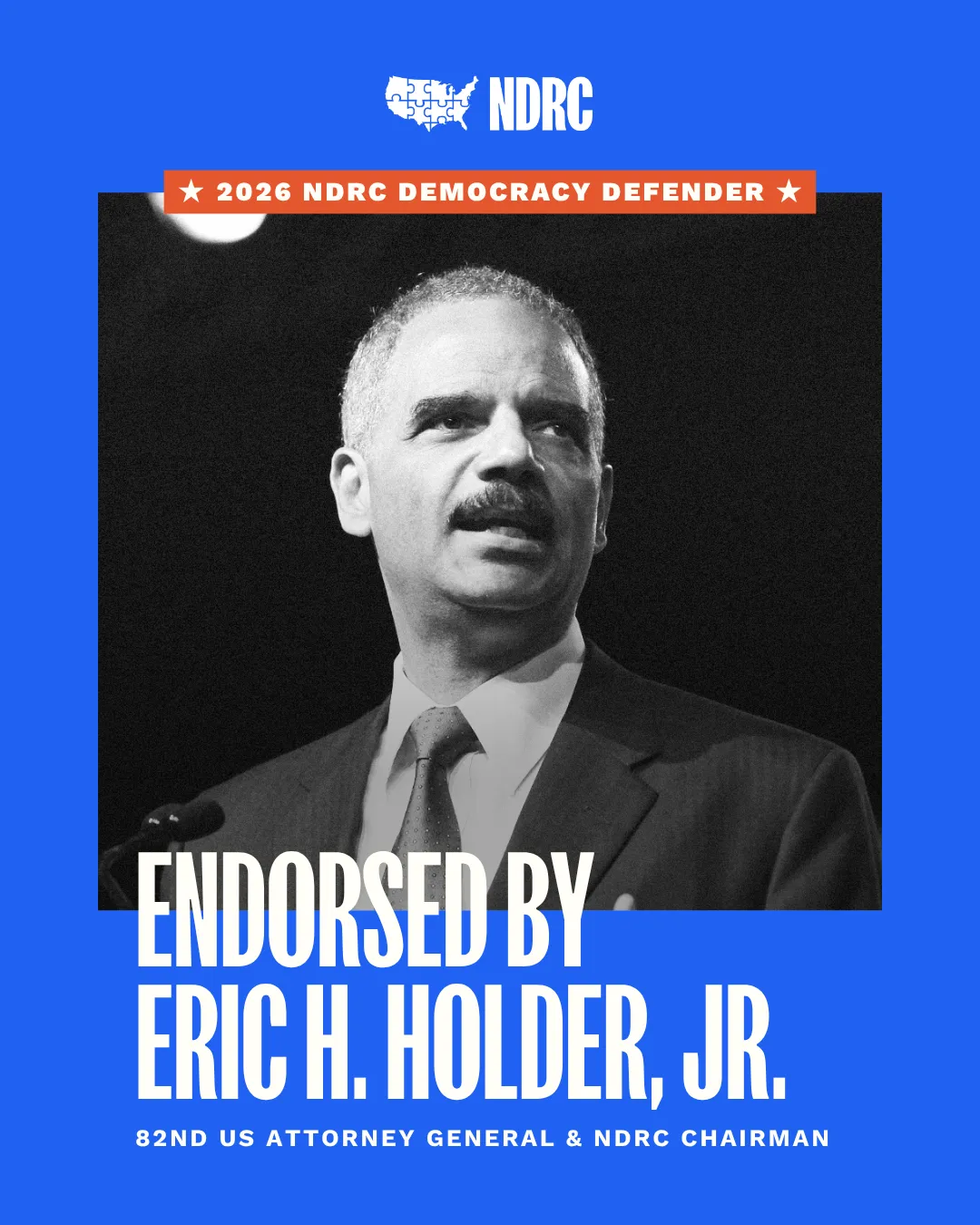 NDRC graphic reading 2026 NDRC Democracy Defender, endorsed by Eric H. Holder, Jr., 82nd US Attorney General and NDRC Chairman.